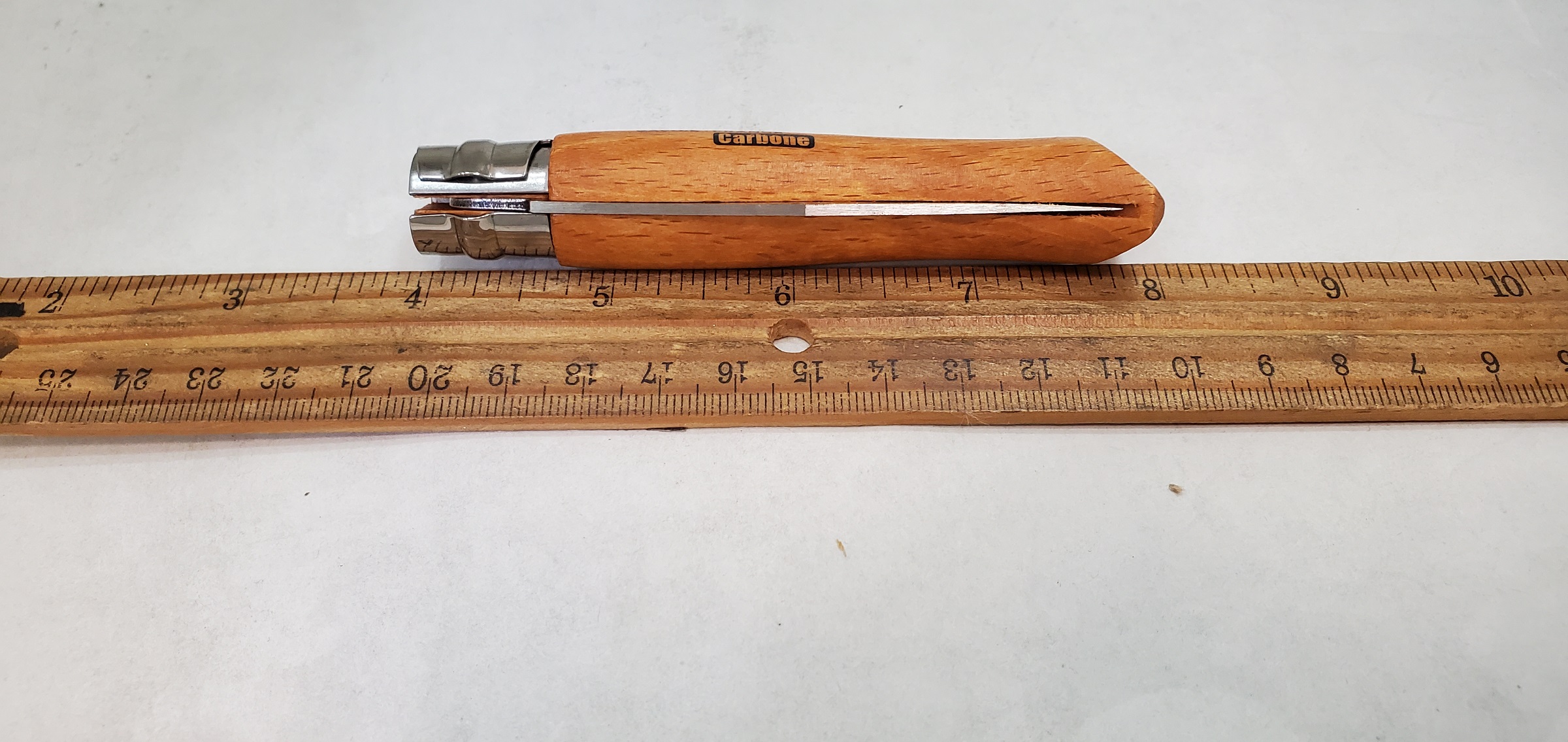 No. 7 Opinel Carbon Knife OP-13070 measures 4 inches when closed.