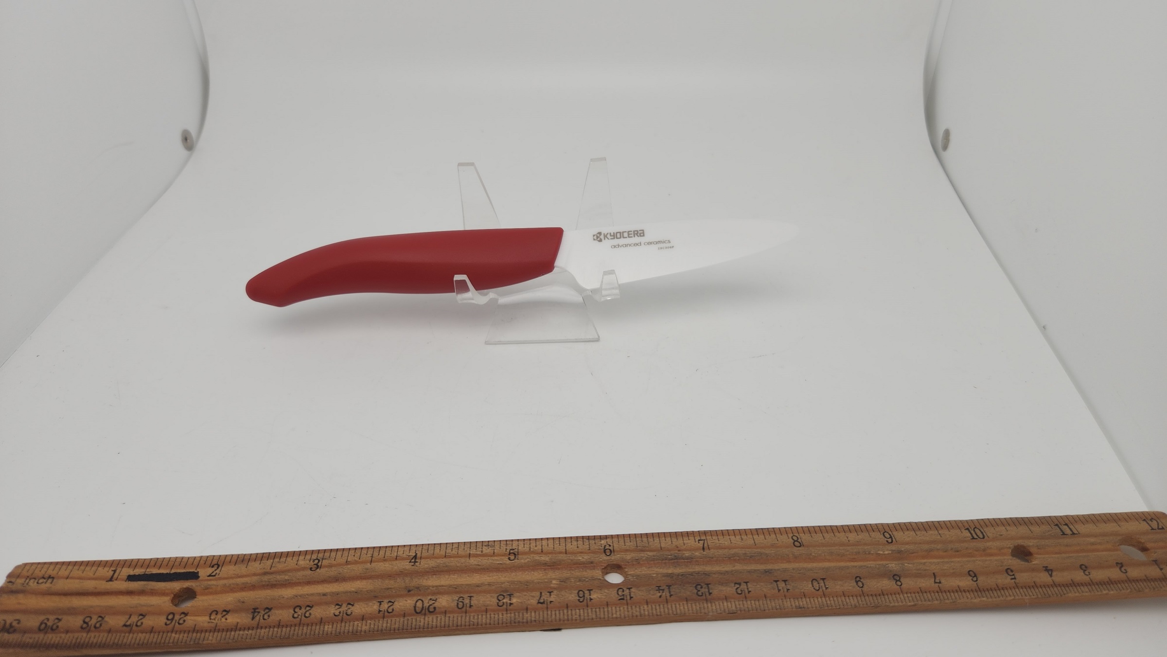 https://heimerdingercutlery.com/wp-content/uploads/2010/11/Kyocera-FK-075-WH-Ceramic-Paring-Knife-3.5-with-Red-Handle.jpg